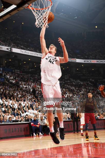 Jakob Poeltl of the Toronto Raptors dunks the ball against the Cleveland Cavaliers in Game Two of Round Two of the 2018 NBA Playoffs on May 3, 2018...