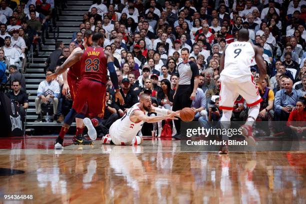 Jonas Valanciunas of the Toronto Raptors passes the ball against the Cleveland Cavaliers in Game Two of the Eastern Conference Semifinals during the...