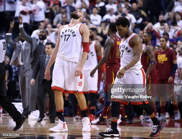 Jonas Valanciunas and Kyle Lowry of the Toronto Raptors react after a missed shot in the second half of Game One of the Eastern Conference Semifinals...