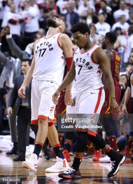 Jonas Valanciunas and Kyle Lowry of the Toronto Raptors react after a missed shot in the second half of Game One of the Eastern Conference Semifinals...