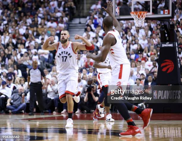 Jonas Valanciunas of the Toronto Raptors reacts after sinking a basket in the second half of Game One of the Eastern Conference Semifinals against...