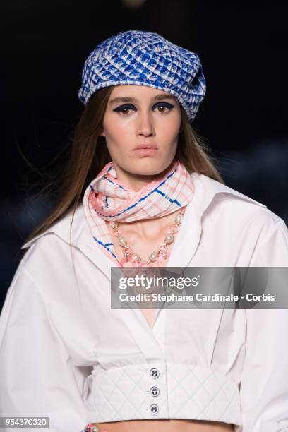 Model walks the runway during the Chanel Cruise 2018/2019 Collection at Le Grand Palais on May 3, 2018 in Paris, France.