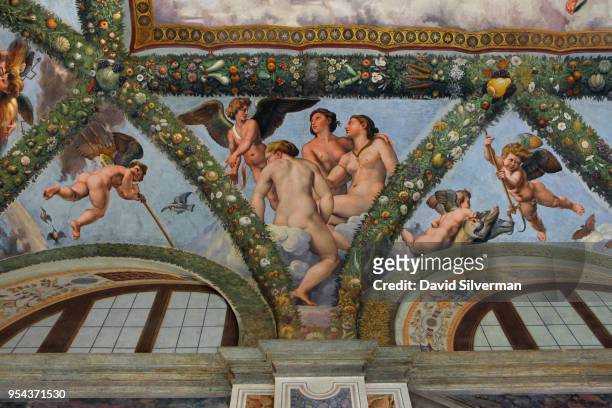 Raphael's Cupid and the Three Graces is a feature of the frescoes which decorate the walls and ceiling of the Loggia of Cupid and Psyche hall, with...
