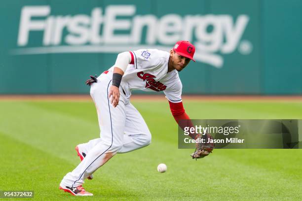 Second baseman Erik Gonzalez of the Cleveland Indians fields a ground ball hit by Yangervis Solarte of the Toronto Blue Jays for an out to end the...