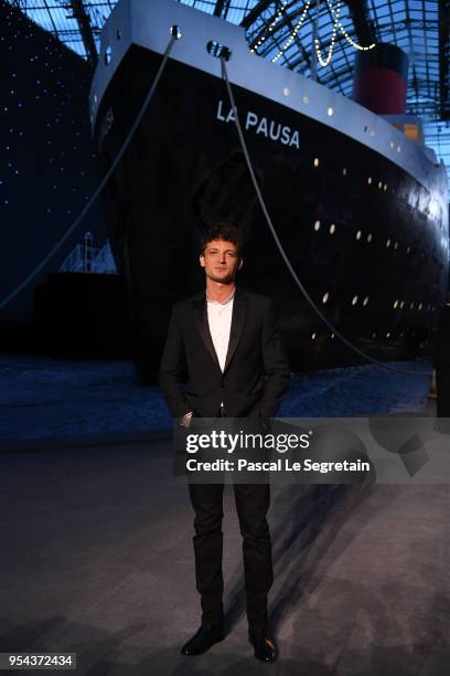 Niels Schneider attends the Chanel Cruise 2018/2019 Collection at Le Grand Palais on May 3, 2018 in Paris, France.