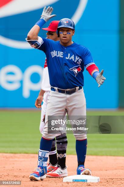 Yangervis Solarte of the Toronto Blue Jays celebrates after hitting a double during the third inning against the Cleveland Indians at Progressive...