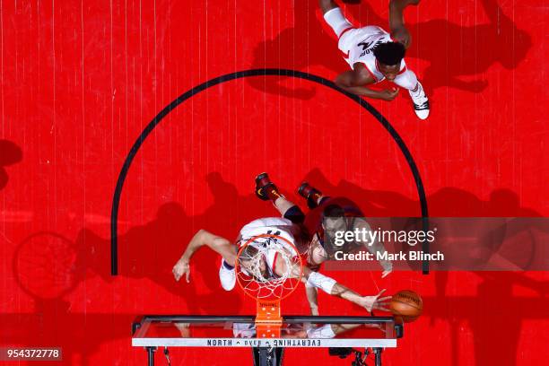 Jonas Valanciunas of the Toronto Raptors blocks the shot by Kevin Love of the Cleveland Cavaliers in Game Two of the Eastern Conference Semifinals...