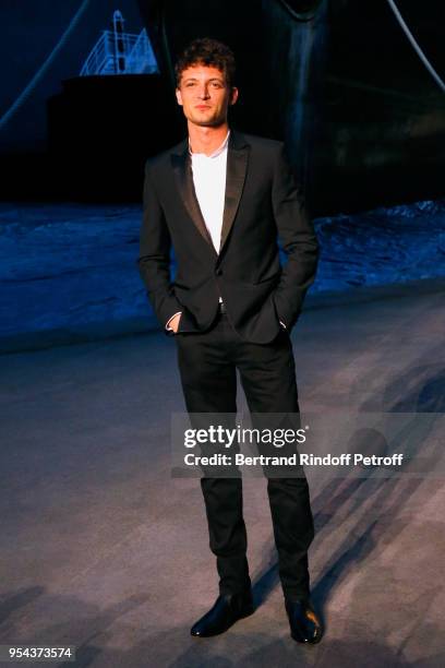 Actor Niels Schneider attends the Chanel Cruise 2018/2019 Collection : Photocall, at Le Grand Palais on May 3, 2018 in Paris, France.