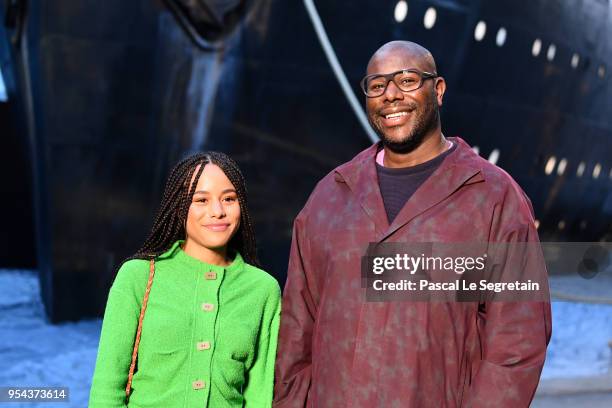 Steve McQueen and a guest attend the Chanel Cruise 2018/2019 Collection at Le Grand Palais on May 3, 2018 in Paris, France.