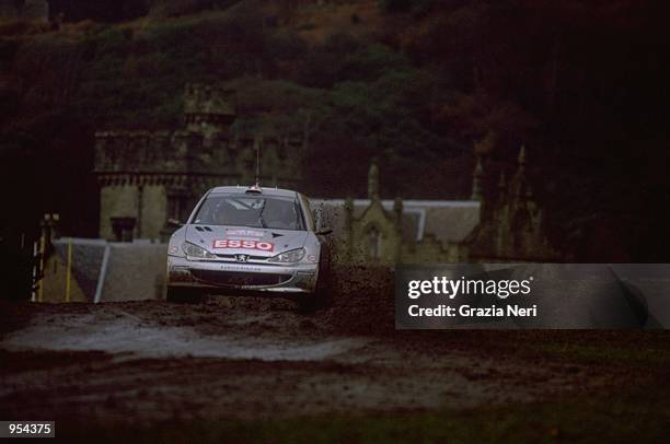 Francois Delecour of France driving the Peugeot 206 WRC during the FIA World Rally Championship around Cardiff, Wales. \ Mandatory Credit: Grazia...