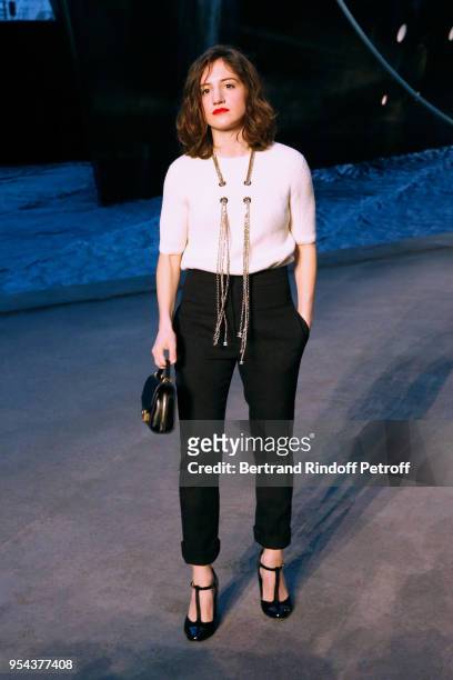Aloise Sauvage attends the Chanel Cruise 2018/2019 Collection : Photocall, at Le Grand Palais on May 3, 2018 in Paris, France.