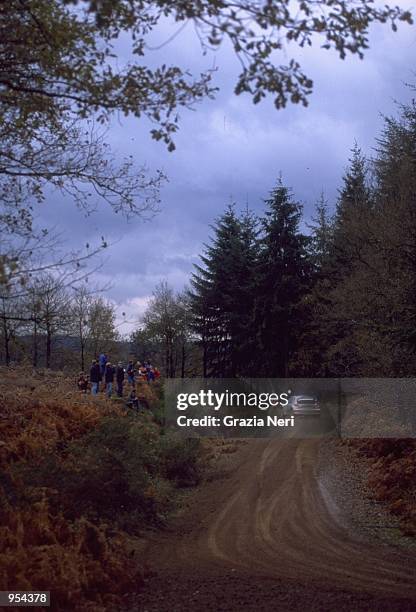 Francois Delecour of France driving the Peugeot 206 WRC during the FIA World Rally Championship around Cardiff, Wales. \ Mandatory Credit: Grazia...