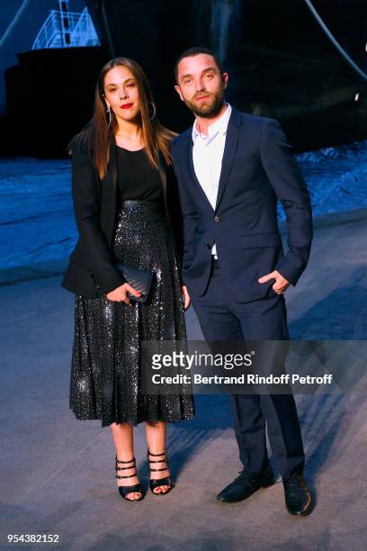 Alysson Paradis and Guillaume Gouix attend the Chanel Cruise 2018/2019 Collection : Photocall, at Le Grand Palais on May 3, 2018 in Paris, France.