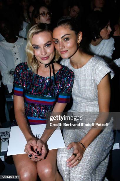 Margot Robbie and Phoebe Tonkin attend the Chanel Cruise 2018/2019 Collection : Photocall, at Le Grand Palais on May 3, 2018 in Paris, France.