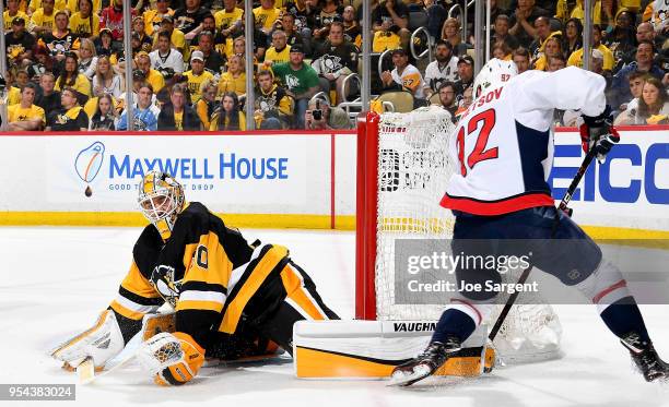 Matt Murray of the Pittsburgh Penguins makes a save on Evgeny Kuznetsov of the Washington Capitals in Game Four of the Eastern Conference Second...