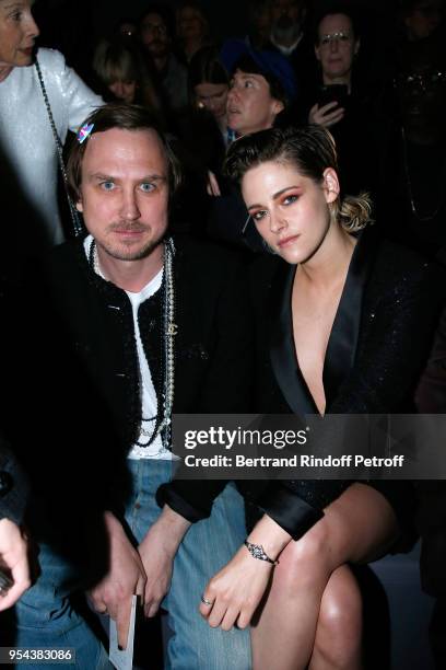 Lars Eidinger and Kristen Stewart attend the Chanel Cruise 2018/2019 Collection : Photocall, at Le Grand Palais on May 3, 2018 in Paris, France.