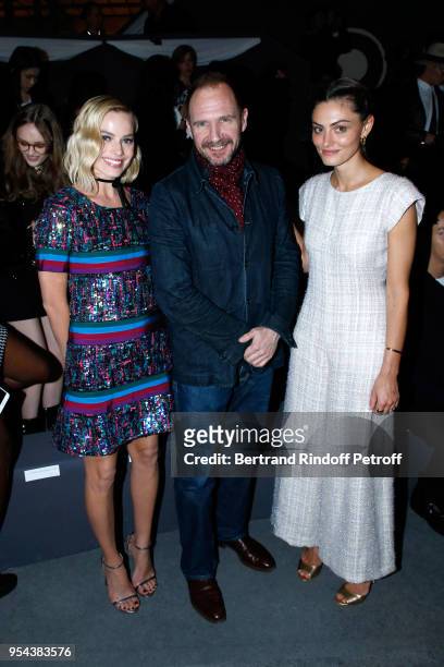 Actors Margot Robbie, Ralph Fiennes and Phoebe Tonkin attend the Chanel Cruise 2018/2019 Collection : Front Row, at Le Grand Palais on May 3, 2018 in...
