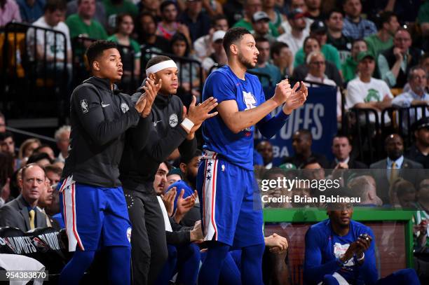 Markelle Fultz Justin Anderson and Ben Simmons of the Philadelphia 76ers look on against the Boston Celtics in Game Two of Round Two of the 2018 NBA...