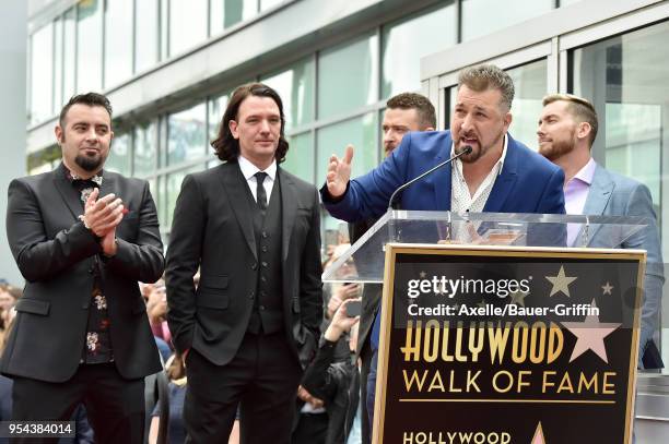 Singers Joey Fatone, Chris Kirkpatrick, Lance Bass, JC Chasez and Justin Timberlake attend the ceremony honoring NSYNC with star on the Hollywood...