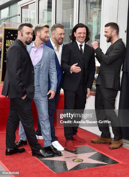 Singers Chris Kirkpatrick, Lance Bass, Joey Fatone, JC Chasez and Justin Timberlake attend the ceremony honoring NSYNC with star on the Hollywood...