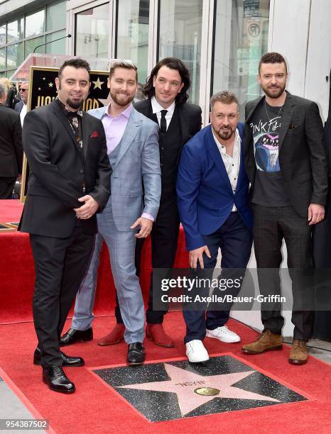 Singers Chris Kirkpatrick, Lance Bass, JC Chasez, Joey Fatone and Justin Timberlake attend the ceremony honoring NSYNC with star on the Hollywood...