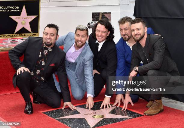 Singers Chris Kirkpatrick, Lance Bass, JC Chasez, Joey Fatone and Justin Timberlake attend the ceremony honoring NSYNC with star on the Hollywood...