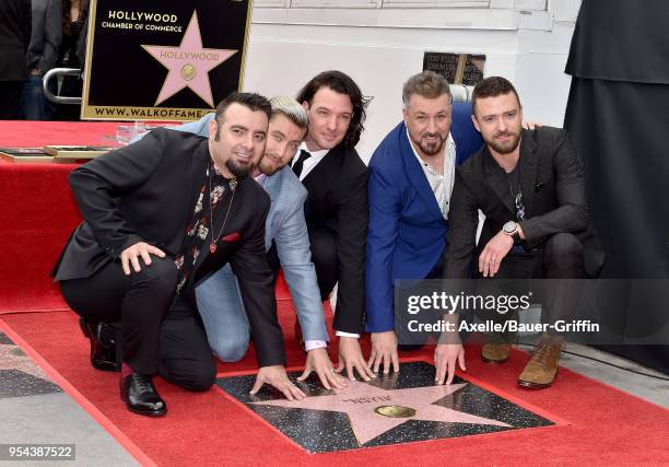 Singers Chris Kirkpatrick, Lance Bass, JC Chasez, Joey Fatone and Justin Timberlake attend the ceremony honoring NSYNC with star on the Hollywood...