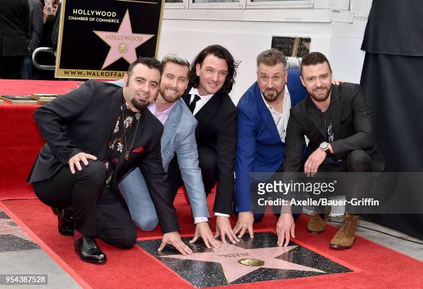 Singers Chris Kirkpatrick, Lance Bass, JC Chasez, Joey Fatone and Justin Timberlake attend the ceremony honoring NSYNC with star on the Hollywood...