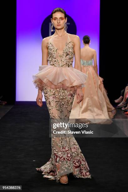 Model walks the runway during the 2018 Future Of Fashion Runway Show at The Fashion Institute of Technology on May 3, 2018 in New York City.