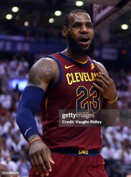 LeBron James of the Cleveland Cavaliers reacts in the second half of Game Two of the Eastern Conference Semifinals against the Toronto Raptors during...