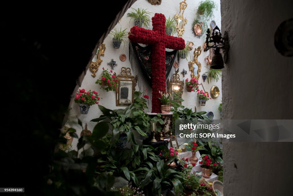 An altar with a decorated cross in the terrace of Carmelitas...