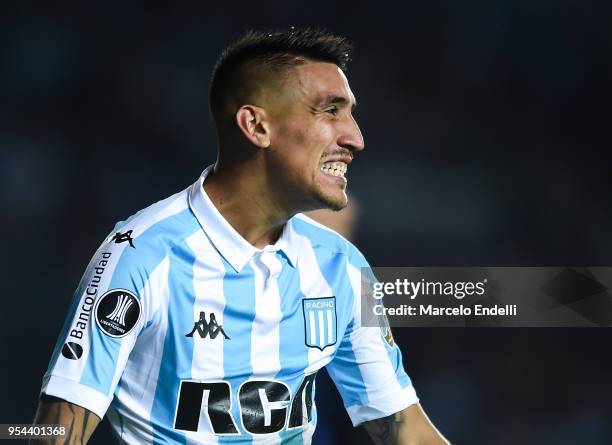 Ricardo Centurion of Racing Club reacts after missing a chance to score during a group stage match between Racing Club and Universidad de Chile as...