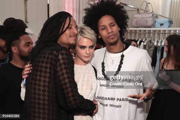 Larry Nicolas Bourgeois, model Cara Delevingne, and Laurent Nicolas Bourgeois of Les Twins attend the opening of Longchamp Fifth Avenue Flagship at...