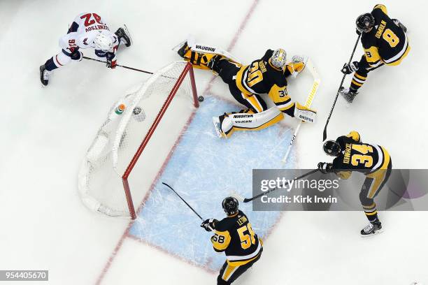 Evgeny Kuznetsov of the Washington Capitals is unable to push the puck into the net behind Matt Murray of the Pittsburgh Penguins during the second...