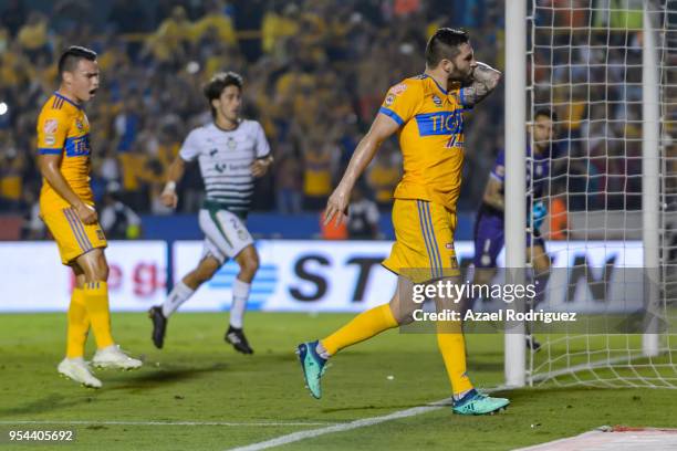 Andre-Pierre Gignac of Tigres celebrates after scoring his teams second goal via penalty during the quarter finals first leg match between Tigres...