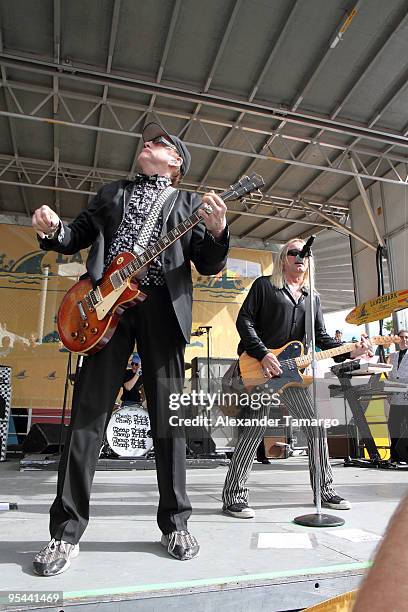 Rick Neilsen and Robin Zander perform at the Miami Dolphins game at Landshark Stadium on December 27, 2009 in Miami, Florida.