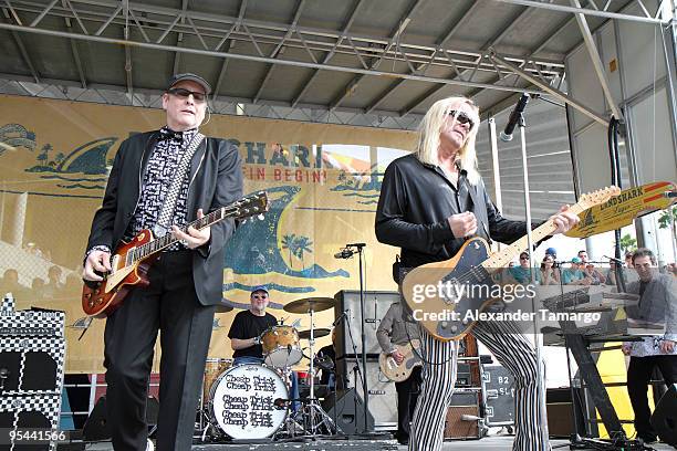 Rick Neilsen and Robin Zander perform at the Miami Dolphins game at Landshark Stadium on December 27, 2009 in Miami, Florida.