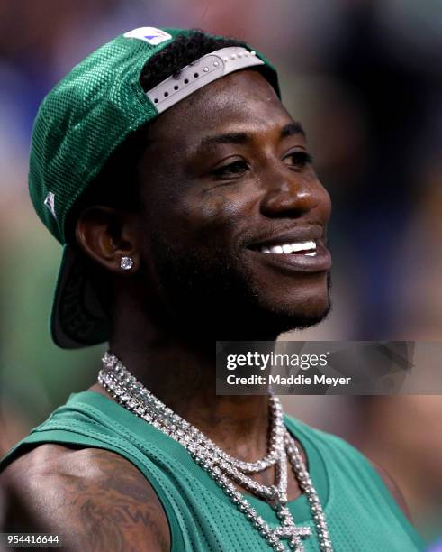 Rapper Gucci Mane looks on during the first quarter of Game Two of the Eastern Conference Second Round between the Boston Celtics and the...