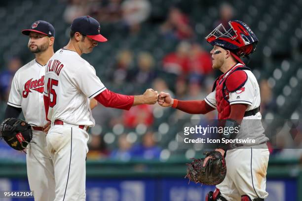 Cleveland pitcher Adam Plutko is congratulated by Cleveland Indians catcher Roberto Perez as he leaves the game during the eighth inning of the Major...