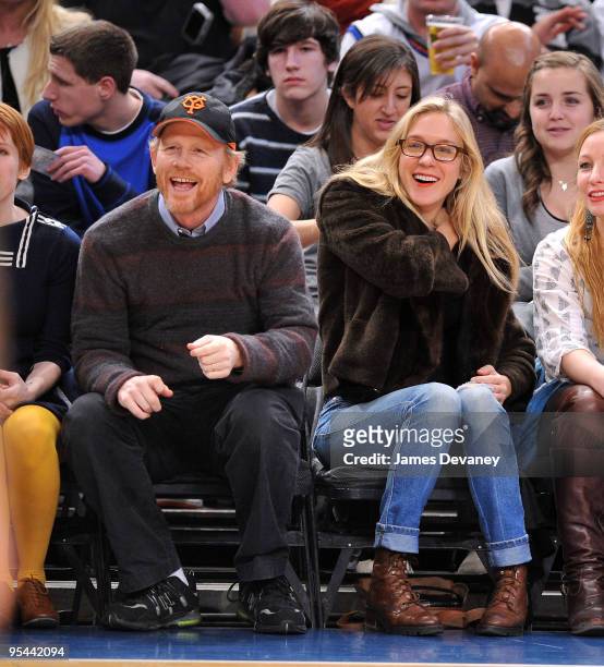 Ron Howard and Chloe Sevigny attend the San Antonio Spurs vs New York Knicks game at Madison Square Garden on December 27, 2009 in New York City.