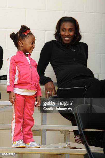 Former WNBA player Lisa Leslie and her daughter Lauren Lockwood attend a game between the Albuquerque Thunderbirds and the Los Angeles D-Fenders at...