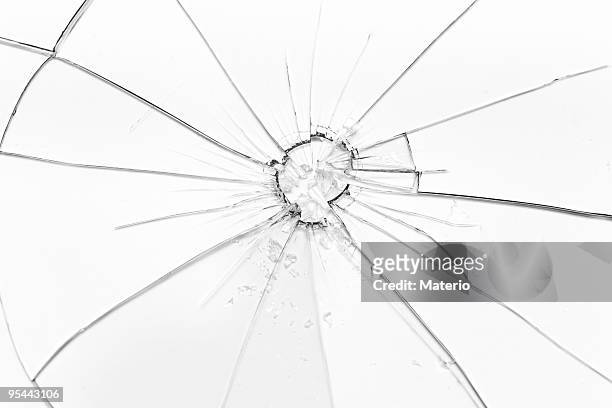 vidrio roto en b & w - balas fotografías e imágenes de stock