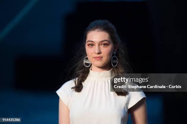 Anamaria Vartolomei attends the Chanel Cruise 2018/2019 Collection at Le Grand Palais on May 3, 2018 in Paris, France.