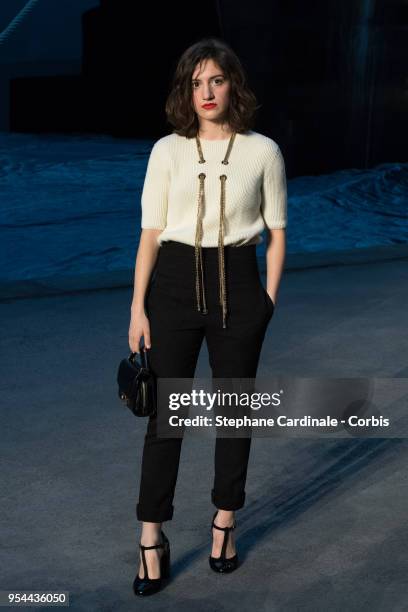 Aloise Sauvage attends the Chanel Cruise 2018/2019 Collection at Le Grand Palais on May 3, 2018 in Paris, France.