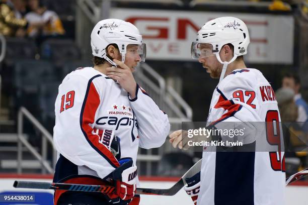 Nicklas Backstrom of the Washington Capitals talks with Evgeny Kuznetsov of the Washington Capitals in Game Three of the Eastern Conference Second...