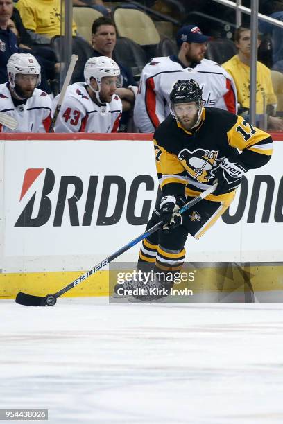 Bryan Rust of the Pittsburgh Penguins controls the puck in Game Three of the Eastern Conference Second Round during the 2018 NHL Stanley Cup Playoffs...