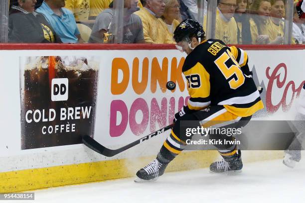 Jake Guentzel of the Pittsburgh Penguins controls the puck in Game Three of the Eastern Conference Second Round during the 2018 NHL Stanley Cup...