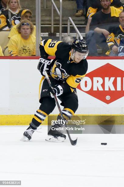 Jake Guentzel of the Pittsburgh Penguins controls the puck in Game Three of the Eastern Conference Second Round during the 2018 NHL Stanley Cup...