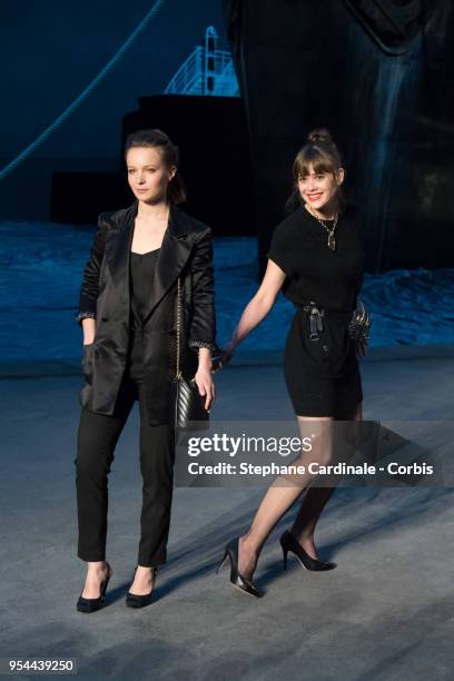 Diane Rouxel and Mathilde Warnier attends the Chanel Cruise 2018/2019 Collection at Le Grand Palais on May 3, 2018 in Paris, France.