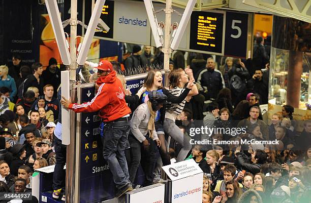 Crowd of flashmob dancers congregates at London Liverpool Street Station on February 06, 2009 in London England.